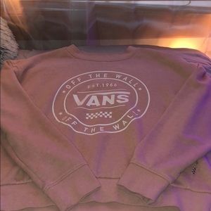 A light pink vans long sleeve shirt.